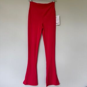 ATHLETA  elation split slim flare . MED/TALL